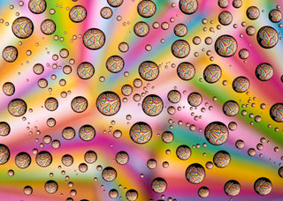 Colorful pattern of water droplets on a surface with a rainbow effect