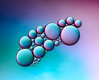 Colorful oil bubbles on a gradient background