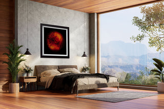 Modern bedroom with a large window view of mountains and trees