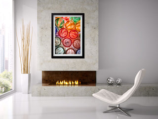 Modern living room with a colorful abstract photograph above a fireplace.